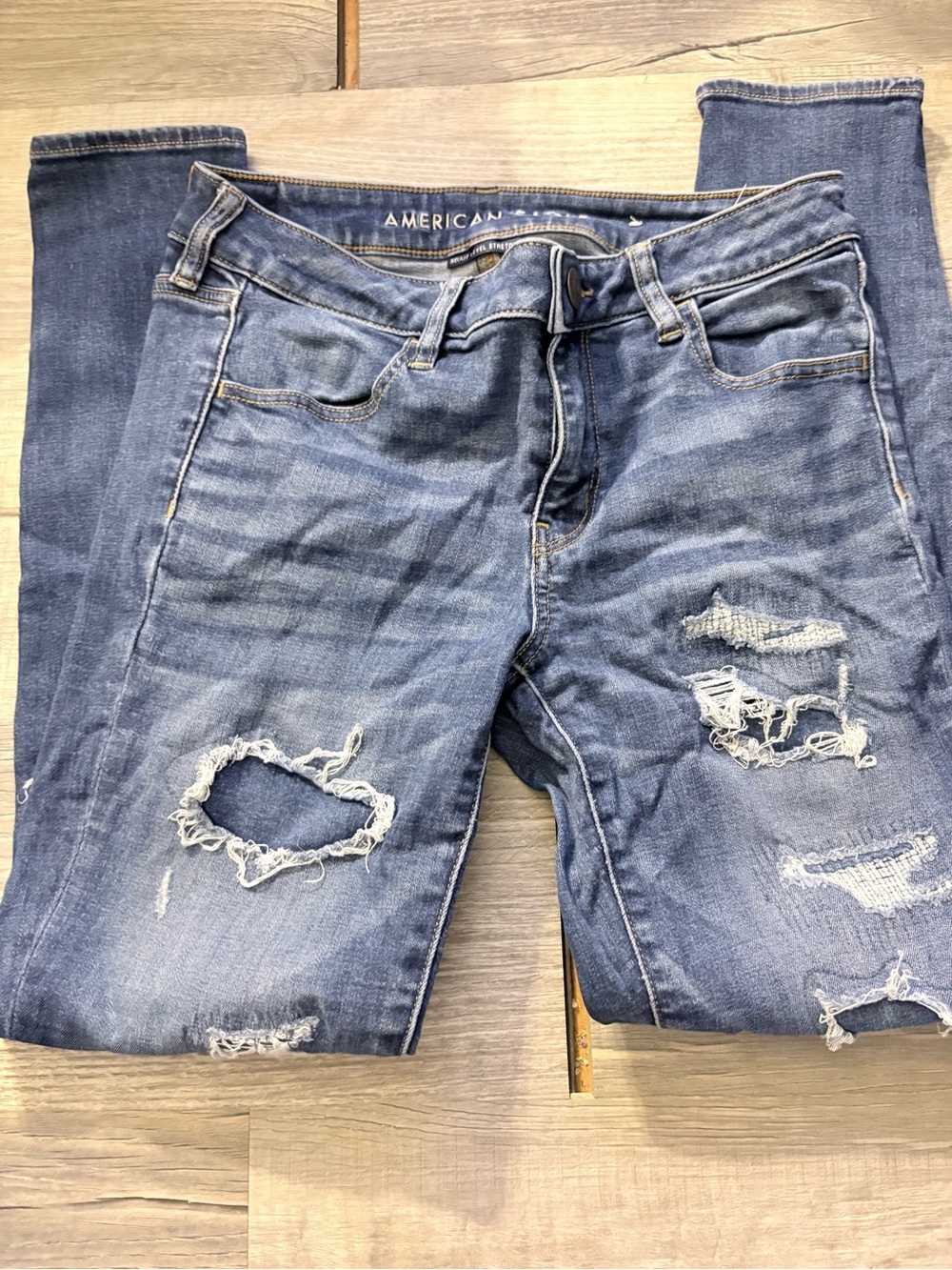 American Eagle Jeggings Women’s 8 Blue distressed medium Wash Ripped Stretch